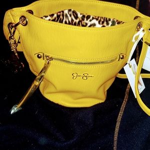 Dandelion colored Jessica Simpson ARDEN  bag with leopard interior